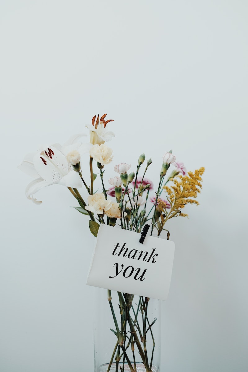 Bunch of Flowers with a Thank You Postcard