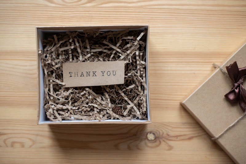 Cardboard gift box with thank you note