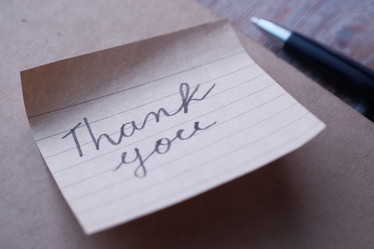 Cursive Thank You Text on a Paper