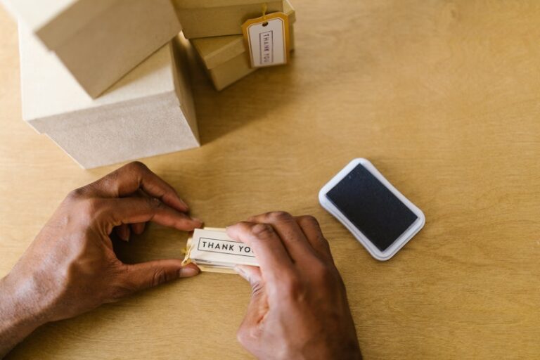 Person Holding a Thank You Card