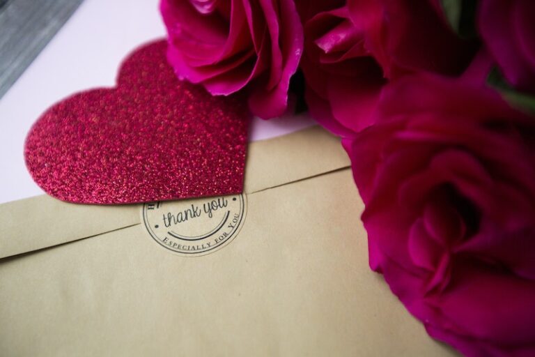 Photo of a Thank you Love Letter Near Roses