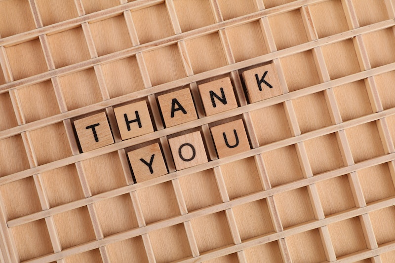 Thank You Letters on Wooden Surface
