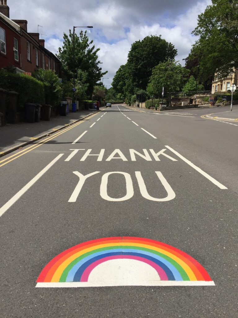 Thank you on road with rainbow